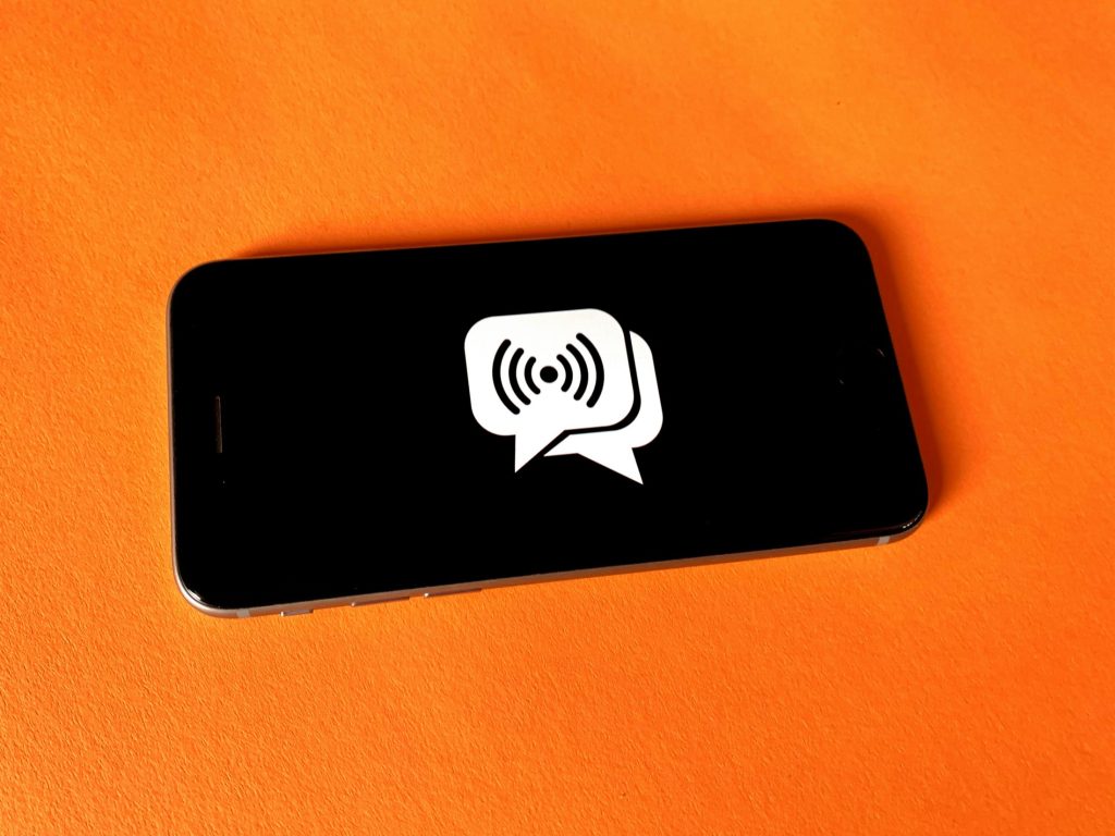 Alert illustration on a smartphone as GovTech Singapore and Google DeepMind have developed an on-device scam detection system based on a fine-tuned Gemma AI model.