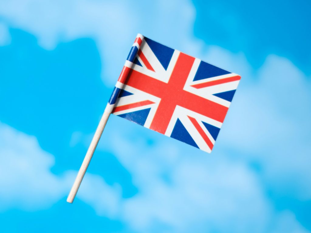 Union Jack flag as the Council for Science and Technology (CST) has urged the UK government to develop an AI sovereignty plan, warning that without urgent action the country risks becoming a high-value AI customer.